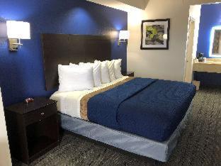Executive Inn And Suites Joaquin Szoba fotó
