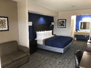 Executive Inn And Suites Joaquin Szoba fotó
