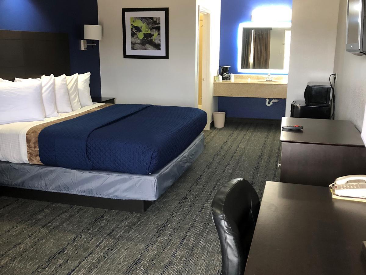 Executive Inn And Suites Joaquin Kültér fotó
