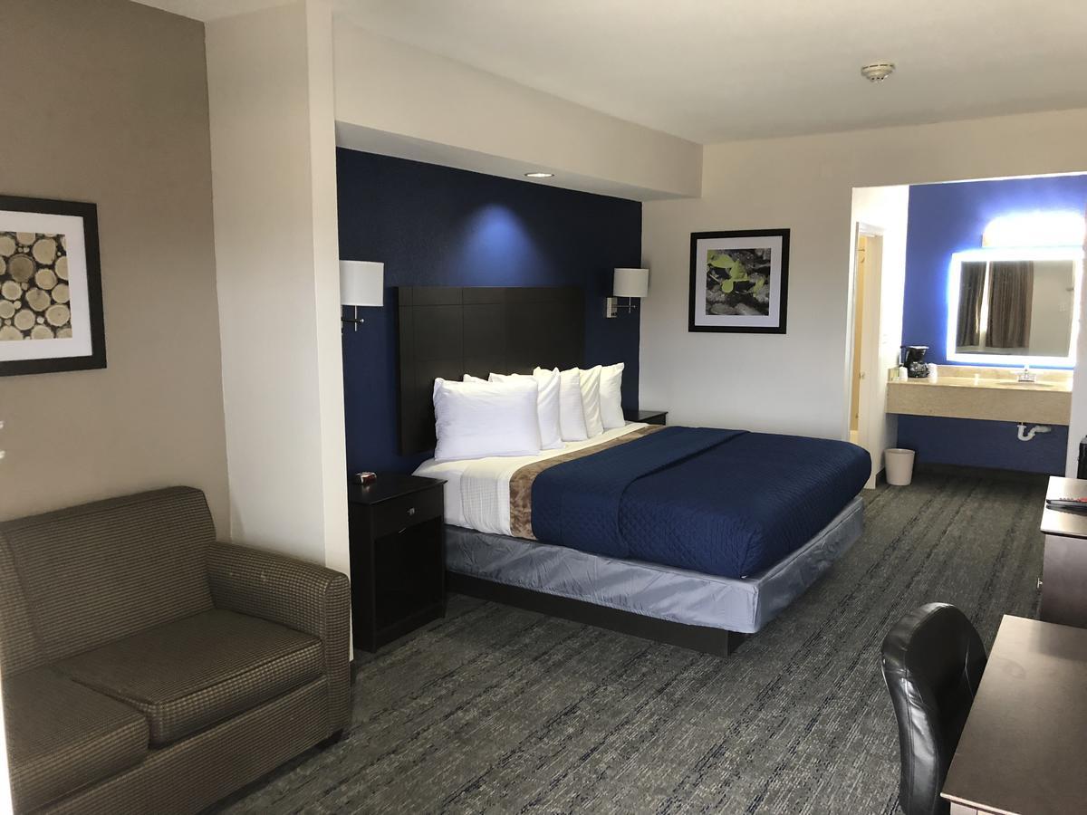 Executive Inn And Suites Joaquin Kültér fotó