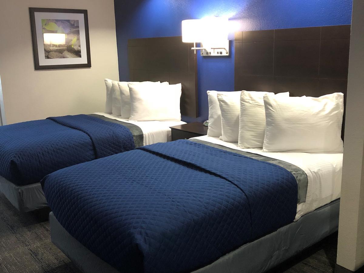 Executive Inn And Suites Joaquin Kültér fotó